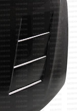 Load image into Gallery viewer, Seibon 11-13 Scion tC (AGT20L) TS-style Carbon Fiber Hood (Does not fit 14) - HD1112SCNTC-TS