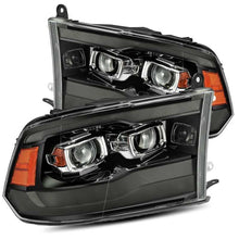 Load image into Gallery viewer, AlphaRex 09-18 Ram 1500HD LUXX Proj Headlight Plnk Style Jet Blk w/Activ Light/Seq Signal/Smoked DRL - 880540