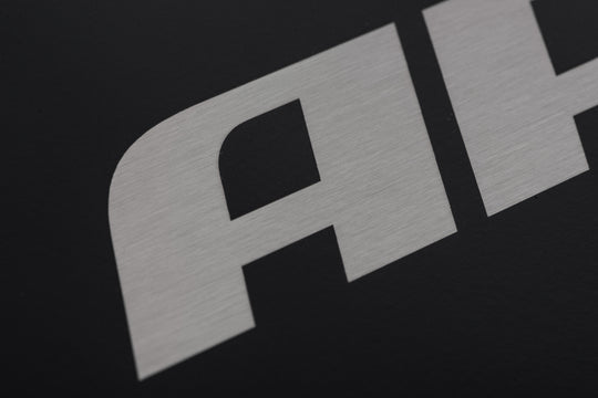 APR License Plate - Silver Logo/Black Plate - A1000015