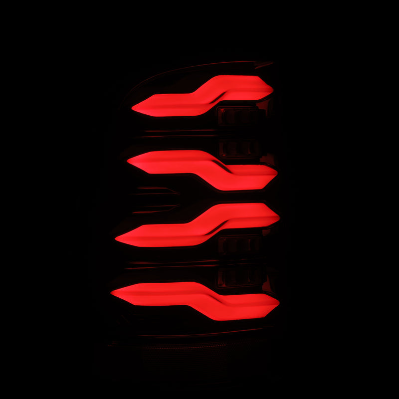 AlphaRex 09-18 Dodge Ram Luxx-Series LED Tail Lights Black w/ Activation Light & Sequential Signal - 640004