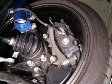 Load image into Gallery viewer, Cusco 23-25 Toyota GR Corolla Light Weight Front Brake Caliper Bracket - Billet Aluminum