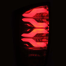 Load image into Gallery viewer, AlphaRex 16-21 Toyota Tacoma LUXX LED Taillights Blk/Red w/Activ Light/Seq Signal - 680000