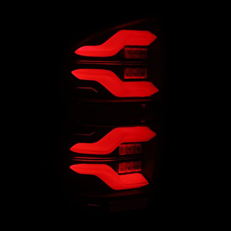 AlphaRex 16-21 Toyota Tacoma LUXX LED Taillights Alpha Blk w/Activ Light/Seq Signal - 680080