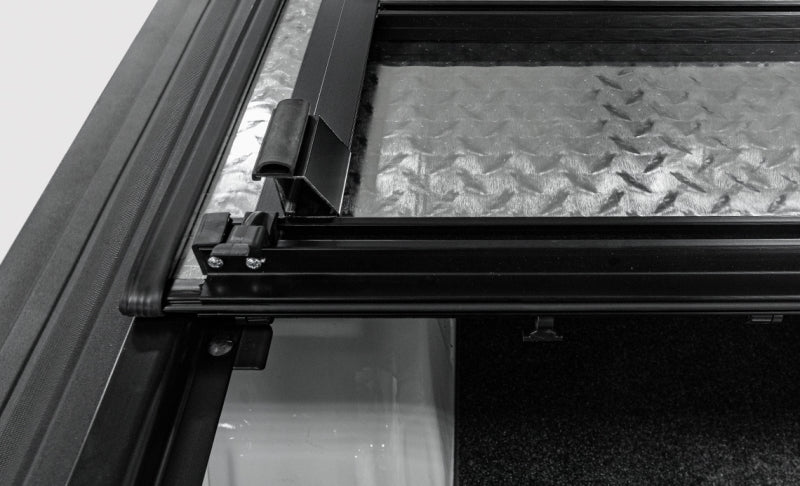 Access LOMAX Folding Hard Cover 16+ Nissan Titan/ XD 6ft 6in Box Black Urethane - B3030029