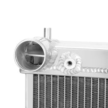 Load image into Gallery viewer, Mishimoto 03-07 Mitsubishi Lancer Evo 7/8/9 Half-Size Performance Aluminum Radiator - MMRAD-EVO-01H