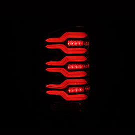 AlphaRex 14-18 GMC Sierra 1500/2500HD/3500HD LUXX-Series LED Tail Lights Alpha-Blk Actv Lgt Seq. Sig