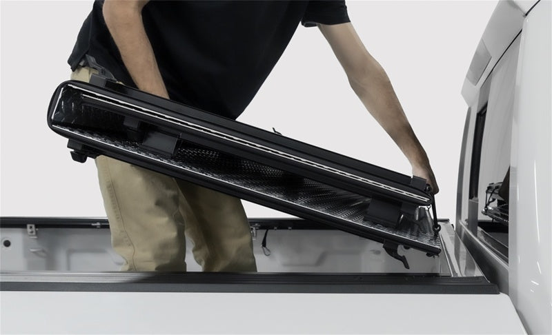 Access LOMAX Alum Tri-Fold Cover w/Split Rails BK Urethane Finish 19-20 Dodge Ram-5ft 7in w/o RamBox - B3040069