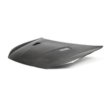 Load image into Gallery viewer, Seibon 10-11 VW Golf GTI 5K/MK6 TM Carbon Fiber Hood w/ Shaved Emblem - HD1011VWGTIB-TM