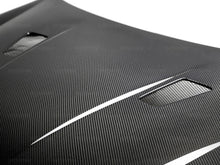 Load image into Gallery viewer, Seibon 10-11 VW Golf GTI 5K/MK6 TM Carbon Fiber Hood w/ Shaved Emblem - HD1011VWGTIB-TM