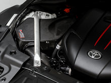 Load image into Gallery viewer, AWE Tuning 2020+ Toyota GR Supra S-FLO Carbon Intake Lid - 2660-15019