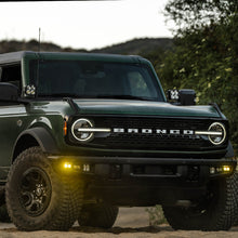 Load image into Gallery viewer, Baja Designs 21-22 Ford Bronco w/Steel Bumper S2 SAE Sportsmen Fog Pocket Light Kit - Amber - 448178