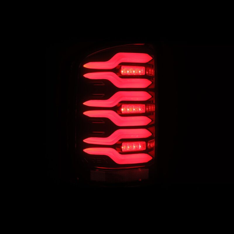 AlphaRex 14-18 GMC Sierra 1500/2500HD/3500HD LUXX-Series LED Tail Lights Blk/Red w/Actv Lgt Seq. Sig - 630050