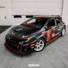 Load image into Gallery viewer, Seibon 2023 Toyota GR Corolla VS-Style Double-Sided Carbon Hood - Gloss Finish - HD23TYGRCOR-VS-DS