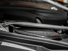 Load image into Gallery viewer, AWE Tuning 2020+ Toyota GR Supra S-FLO Carbon Intake Lid - 2660-15019