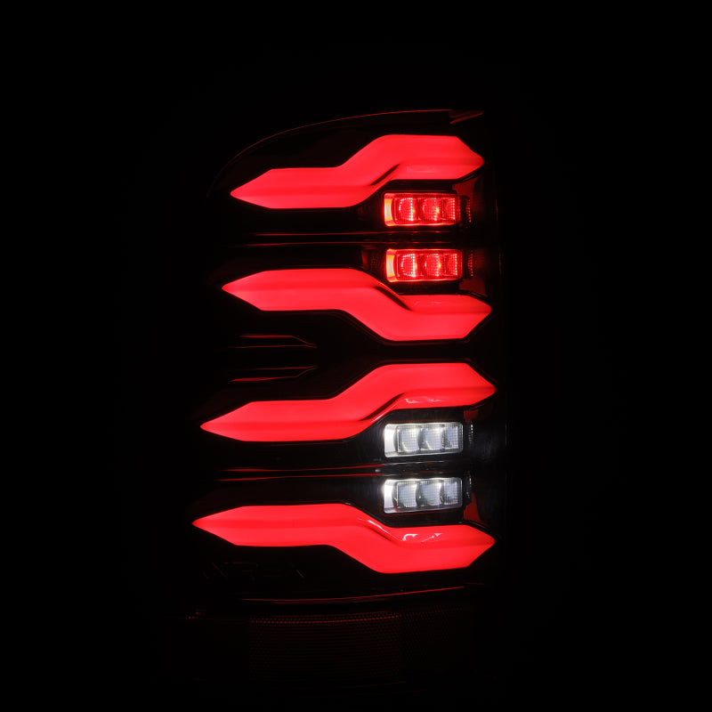 AlphaRex 09-18 Dodge Ram Luxx-Series LED Tail Lights Black w/ Activation Light & Sequential Signal - 640004