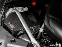 Load image into Gallery viewer, AWE Tuning 2020+ Toyota GR Supra S-FLO Carbon Intake Lid - 2660-15019