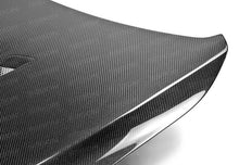 Load image into Gallery viewer, Seibon 12-14 BMW F30 / F32 BM-Style Carbon Fiber Hood - HD1213BMWF30-BM