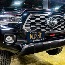 Load image into Gallery viewer, Mishimoto 16-23 Toyota Tacoma License Plate Relocation Kit - MMLP-TAC-16