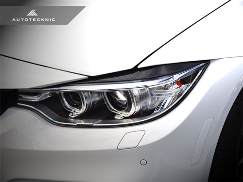 AutoTecknic Carbon Fiber Headlight Trim Set - BMW F80 M3 | F82/ F83 M4