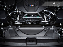 Load image into Gallery viewer, AutoTecknic Dry Carbon Fiber Crosslink Cooling Shroud - BMW G90/ G99 M5