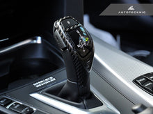 Load image into Gallery viewer, AutoTecknic Carbon Fiber Gear Selector Cover - BMW (Sport Automatic Transmission Equipped Only)