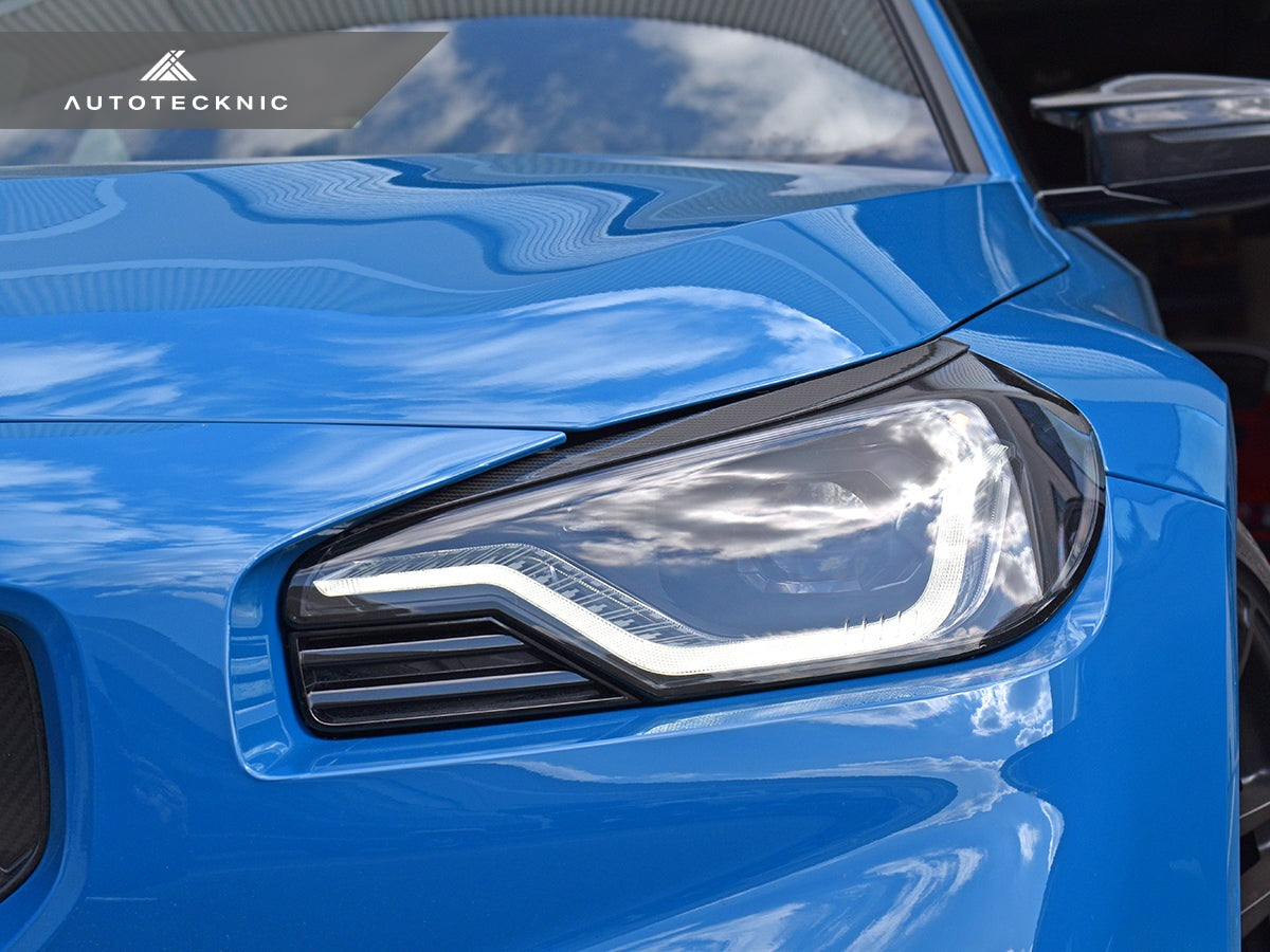 AutoTecknic Carbon Fiber Headlight Trim Set - BMW G87 M2
