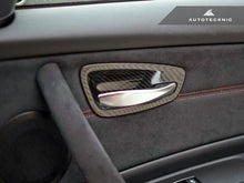 Load image into Gallery viewer, AutoTecknic Dry Carbon Interior Door Handle Trim Set - BMW E82 1M | 1-Series