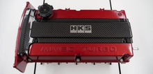 Load image into Gallery viewer, HKS CARBON PLUG COVER 4G63 (Lancer Evolution IV - IX) - 45999-AM002