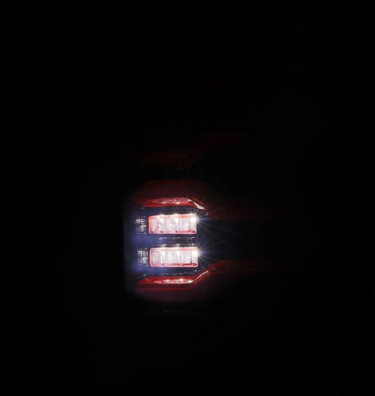 AlphaRex 09-18 Dodge RAM LUXX-Series LED Taillights Black Red w/Actv Light & SS - 640002