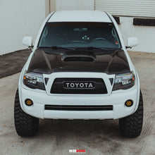 Load image into Gallery viewer, Seibon 05-11 Toyota Tacoma TR-Style Carbon Fiber Hood - HD05TYTA-TR