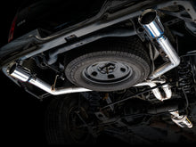 Load image into Gallery viewer, AWE Tuning 09-18 RAM 1500 5.7L (w/o Cutout) 0FG Dual Rear Exit Cat-Back Exhaust - Chrome Silver Tips - 3015-32101