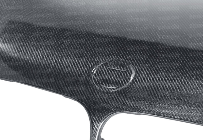 Seibon 02-05 BMW 3 Series 4dr E46 (Manuf Date 7/02-7/06 Models Only) OEM-Style Carbon Fiber Hood - HD0205BMWE464D-OE