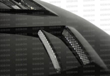 Load image into Gallery viewer, Seibon 08-09 Mitsubishi Lancer (CYA4/5A) DV Style Carbon Fiber Hood - HD0809MITLAN-DV