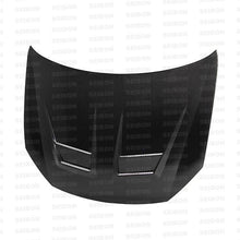 Load image into Gallery viewer, Seibon 10-11 VW Golf GTI 5K/MK6 DV Carbon Fiber Hood w/ Shaved Emblem - HD1011VWGTIB-DV