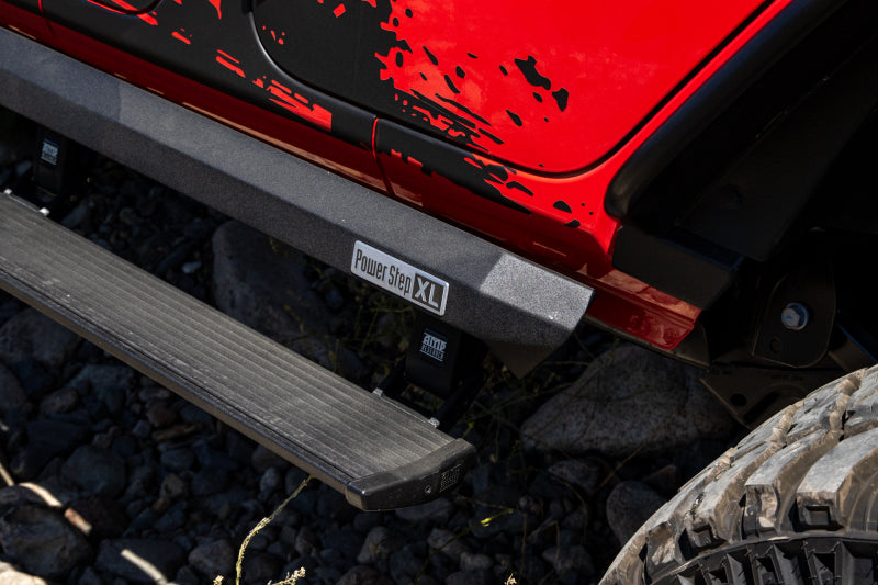 AMP Research 2007-2018 Jeep Wrangler JKU 4DR PowerStep XL - Black (Incl OEM Style Illumination) - 77122-01A