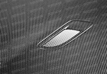 Load image into Gallery viewer, Seibon 10-12 BMW E92 2DR LCI BM Style Carbon Fiber Hood - HD1112BMWE922D-BM