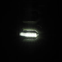 Load image into Gallery viewer, AlphaRex 07-08 Dodge Ram1500/07-09 Dodge Ram 2500+3500 Luxx-Series LED Tail Lights(Pair) Alpha Black - 641050