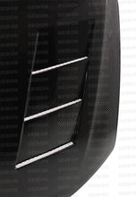 Load image into Gallery viewer, Seibon 11-13 Scion tC (AGT20L) TS-style Carbon Fiber Hood (Does not fit 14) - HD1112SCNTC-TS