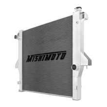 Load image into Gallery viewer, Mishimoto 03-10 Dodge Ram 2500 w/ 5.9L/6.7L Cummins Engine Aluminum Performance Radiator - MMRAD-RAM-03