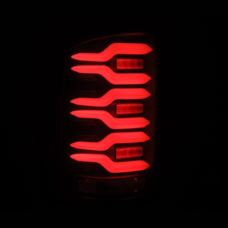AlphaRex 14-18 GMC Sierra 1500/2500HD/3500HD LUXX-Series LED Tail Lights Blk w/Actv Light & Seq. Sig - 630040