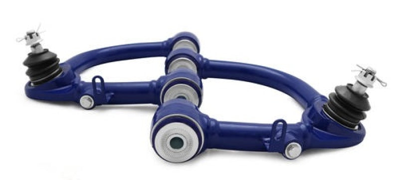 SuperPro Toyota Land Cruiser 100 Series Front Upper Fixed Offset Control Arm Set - TRC6720