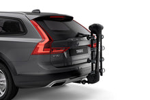 Load image into Gallery viewer, Thule Apex XT 4 - Hanging Hitch Bike Rack w/HitchSwitch Tilt-Down (Up to 4 Bikes) - Black - 9025XT