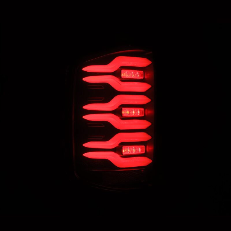 AlphaRex 14-18 Chevrolet Silverado Luxx-Series LED Tail Lights Black w/Activ Light/Seq Signal - 620030