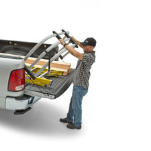 Load image into Gallery viewer, AMP Research 99-23 Ford F250/350 Superduty (Excl. SuperCrew) BedXtender - Silver - 74814-00A