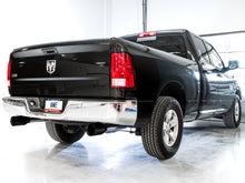 Load image into Gallery viewer, AWE Tuning 09-18 RAM 1500 5.7L (w/o Cutout) 0FG Dual Rear Exit Cat-Back Exhaust - Diamond Black Tips - 3015-33104