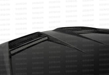 Load image into Gallery viewer, Seibon 10-11 VW Golf GTI 5K/MK6 DV Carbon Fiber Hood w/ Shaved Emblem - HD1011VWGTIB-DV