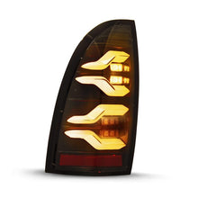 Load image into Gallery viewer, AlphaRex 05-15 Toyota Tacoma LUXX LED Taillights Alpha Blk w/Activ Light/Seq Signal - 680050