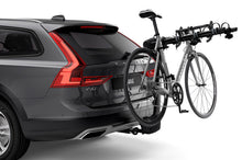 Load image into Gallery viewer, Thule Apex XT 4 - Hanging Hitch Bike Rack w/HitchSwitch Tilt-Down (Up to 4 Bikes) - Black - 9025XT