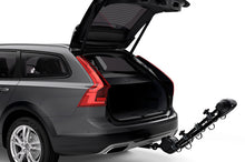 Load image into Gallery viewer, Thule Apex XT 4 - Hanging Hitch Bike Rack w/HitchSwitch Tilt-Down (Up to 4 Bikes) - Black - 9025XT